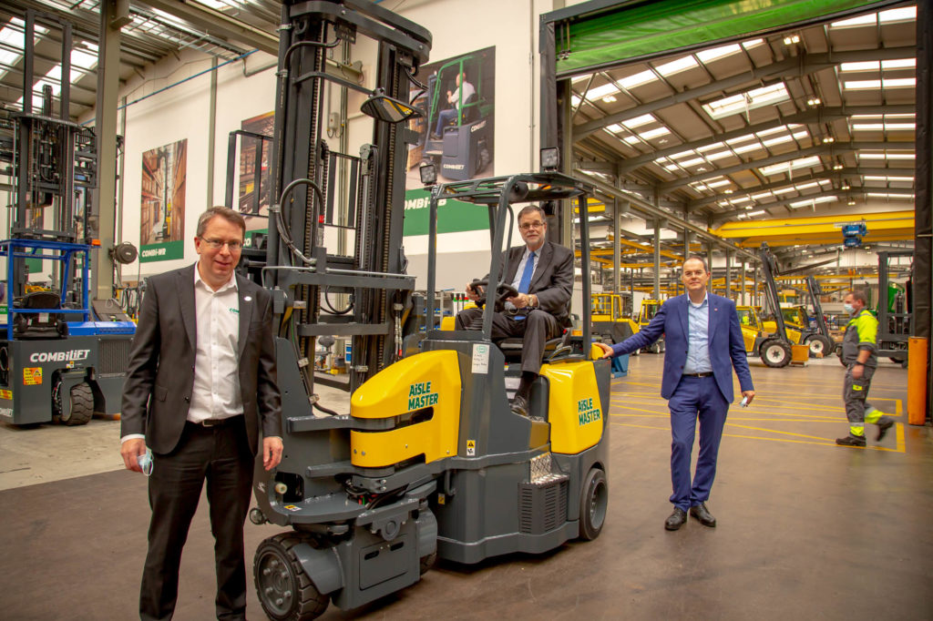 CEO Martin McVicar, Thomas Nader the Austrian Ambassador & Josef Treml the Trade Commissioner & Commercial Counsellor visit Combilift Headquarters. Aisle Master in Combilift Warehouse.