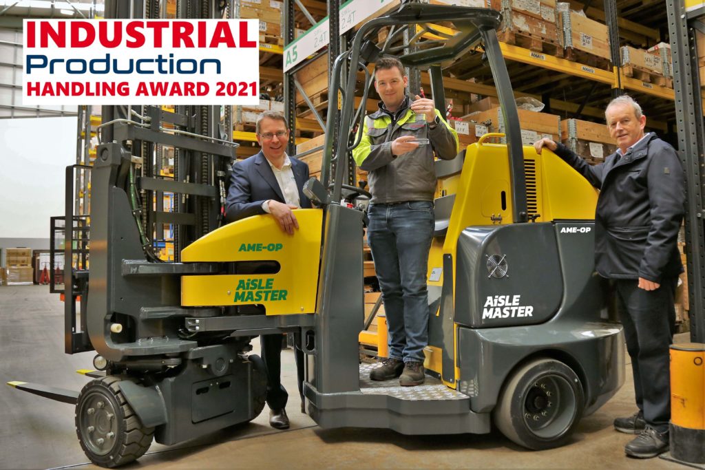 Co-Founders Martin McVicar and Robert Moffett accept the Industrial Production Handling Award 2021 with worker holding award on Aisle-Master (AME-OP)