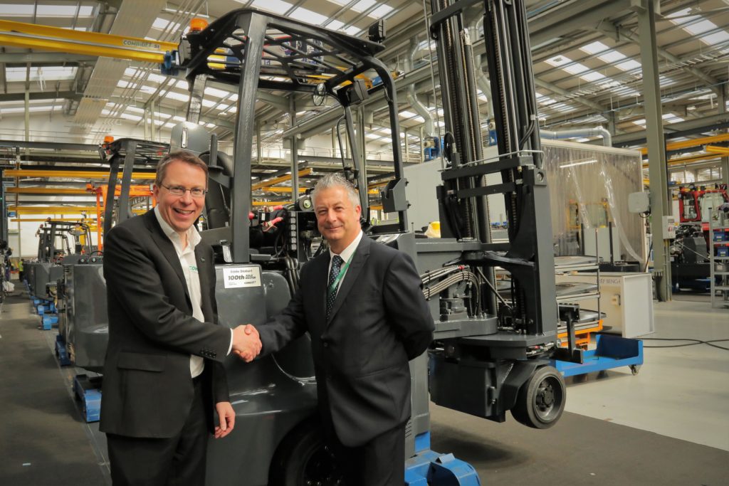 CEO of Combilift Martin McVicar shaking hands with